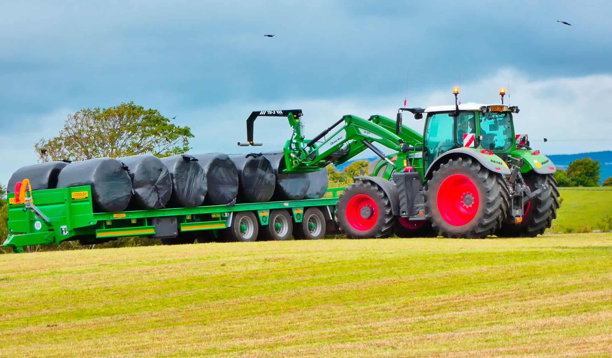 TR-3 Bale Handler Loading Bales in a Field 
